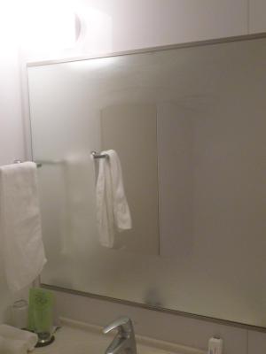 unsteamed patch on hotel mirror